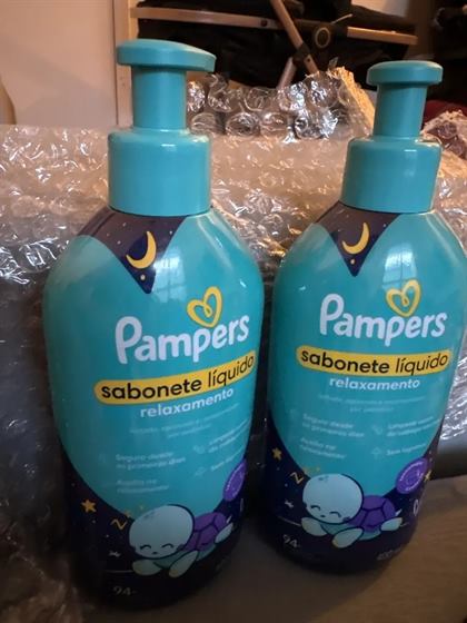 Cliente com o kit Pampers