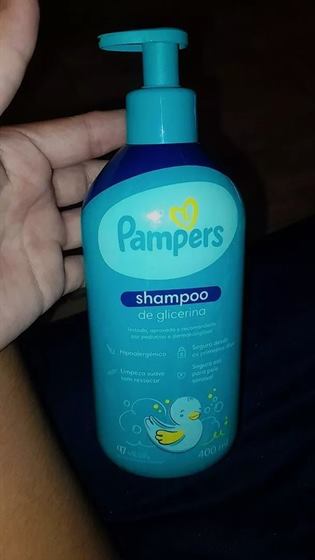 Cliente com o kit Pampers