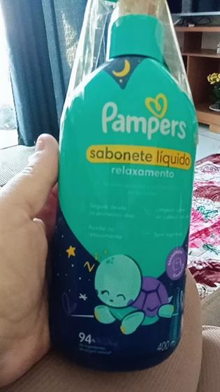 Cliente com o kit Pampers