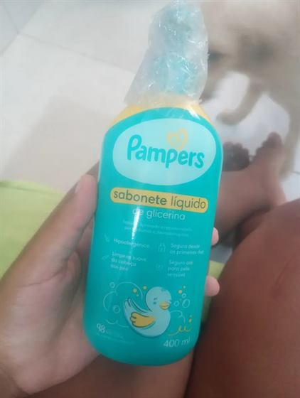 Cliente com o kit Pampers